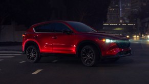 A red 2022 Mazda CX-5 is parked.