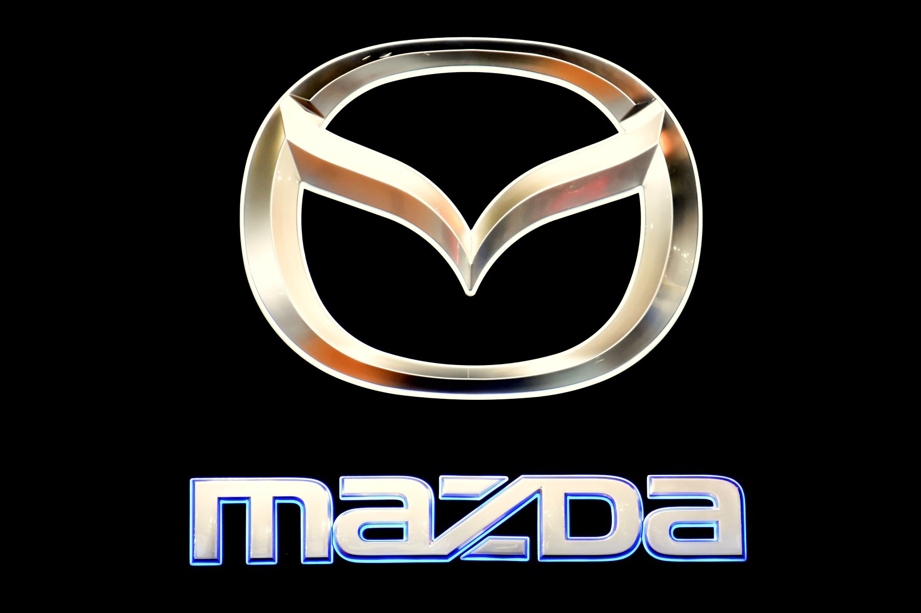 The Mazda logo seen at the Automobile Trade Fair in Barcelona, Spain