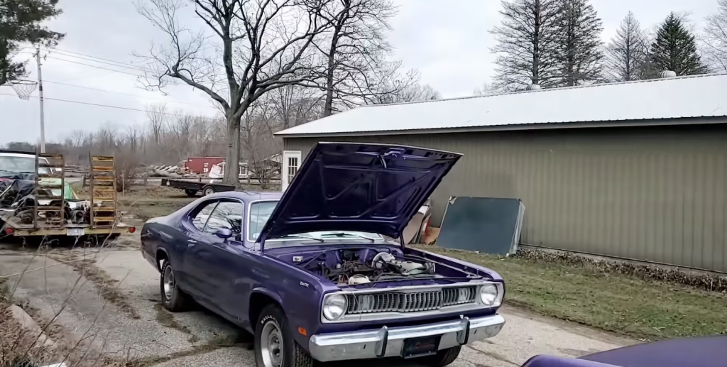 Plymouth Duster barn find in plumb crazy purple Mopar car 