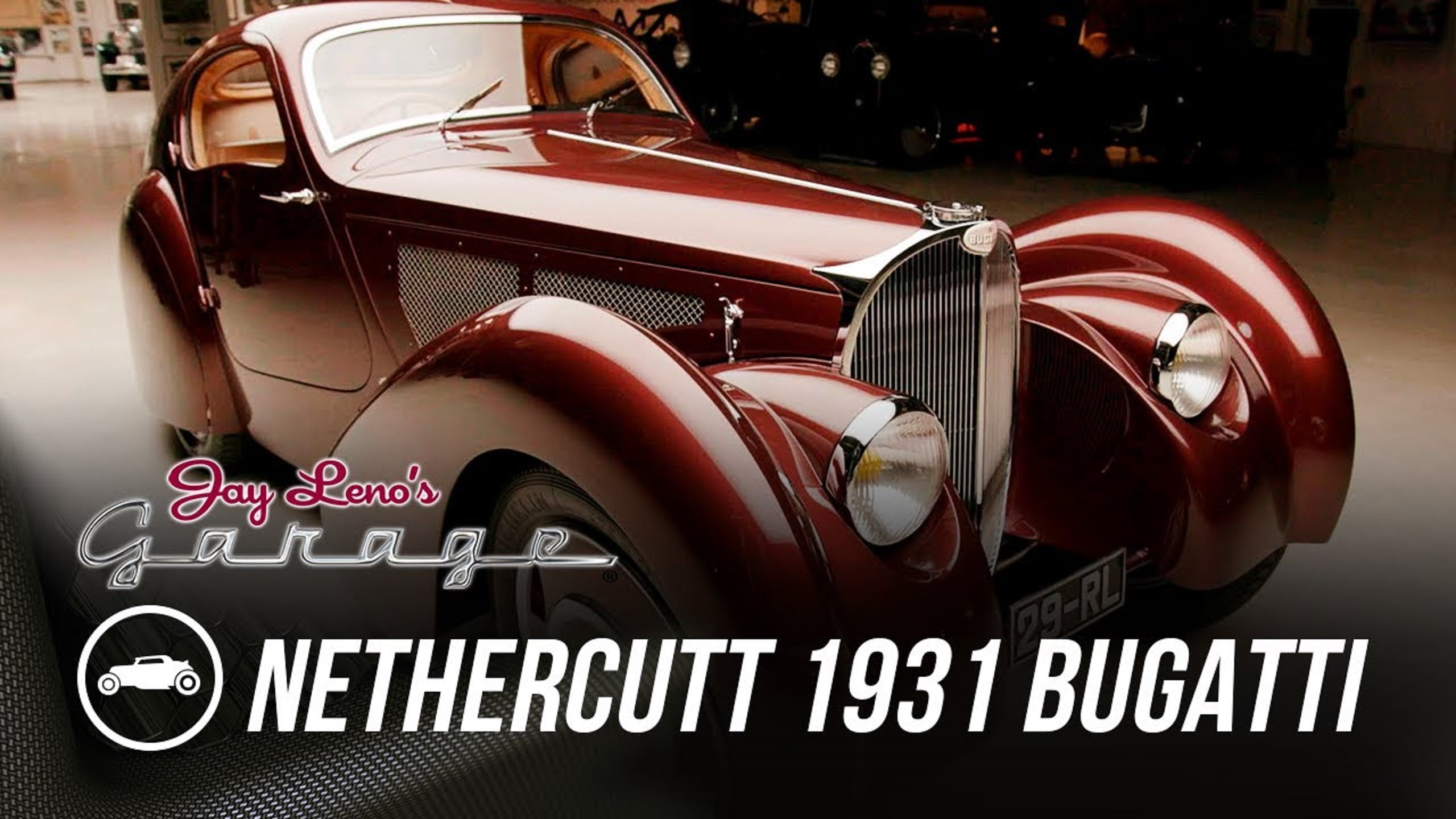 The Nethercutt Collection's burgundy 1931 Bugatti Type 51 Dubos Coupe in Jay Leno's garage
