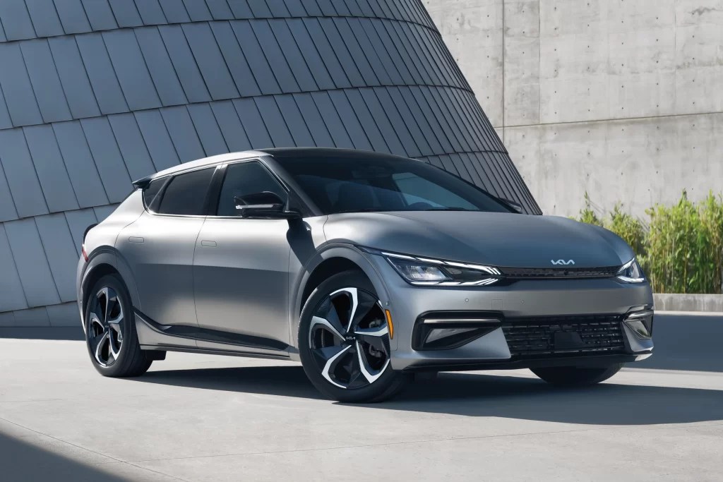 A grey 2022 Kia EV6 shows off its futuristic styling as an EV SUV. Inside there is ample room to make it a family SUV.