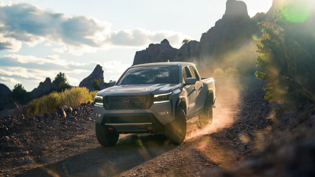 Wearing grey paint the 2022 Nissan Frontier shows its capability as a mid-size truck in a desert environment. 
