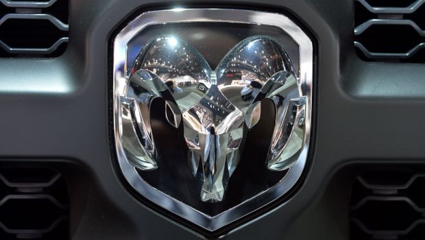 The Ram logo on the front of a truck grille