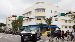 Hummer SUV corner pedestrians crosswalk