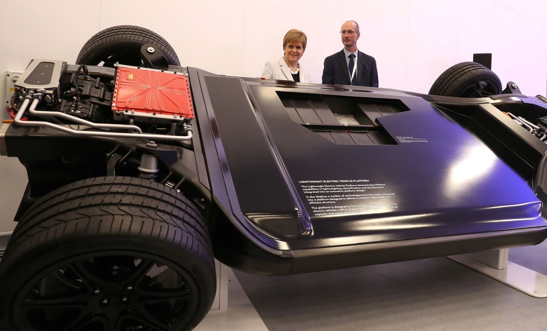 Scotland's First Minister Nicola Sturgeon looking at electric vehicle platform from Williams Advanced Engineering