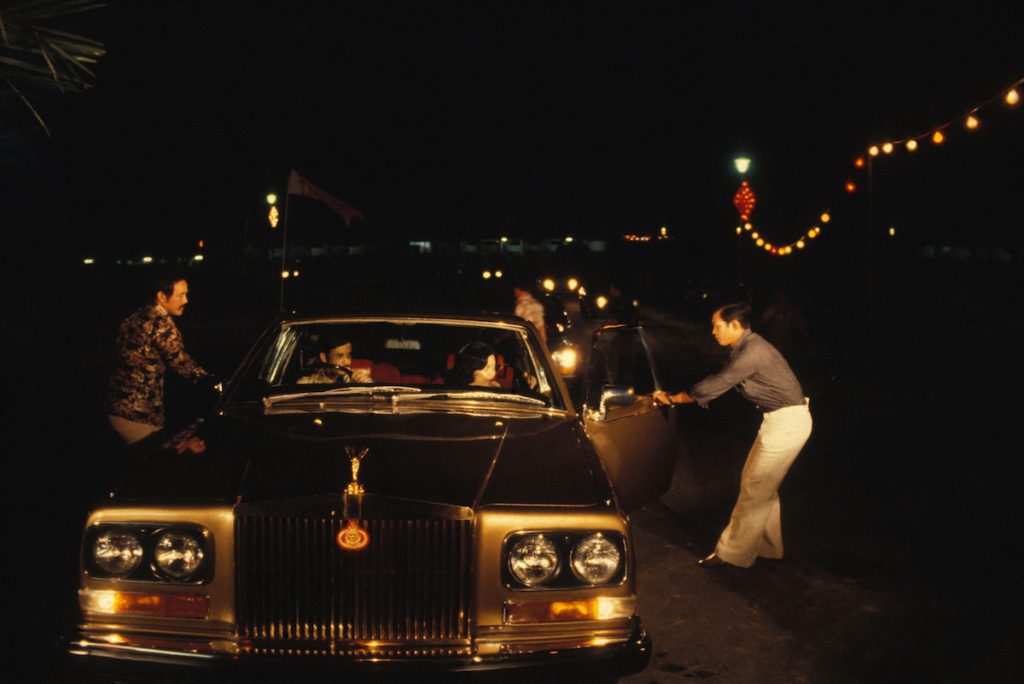 The sultan of Brunei getting into a Rolls-Royce