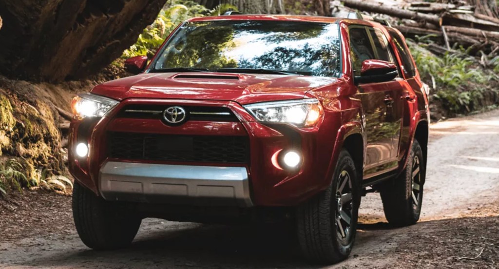 A red 2022 Toyota 4Runner is driving off-road.