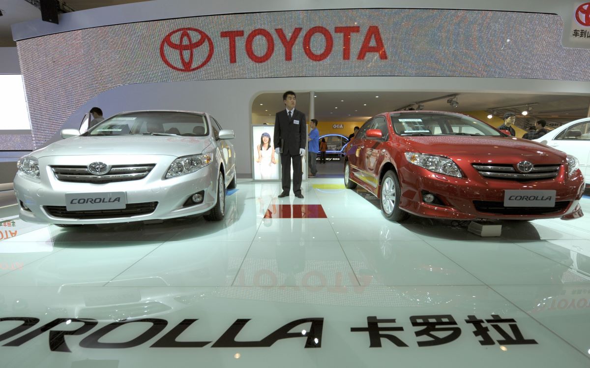 Toyota Corolla models on display, which can now be bought as affordable used cars.