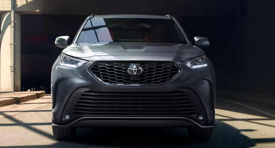 A gray 2022 Toyota Highlander midisize SUV is parked.