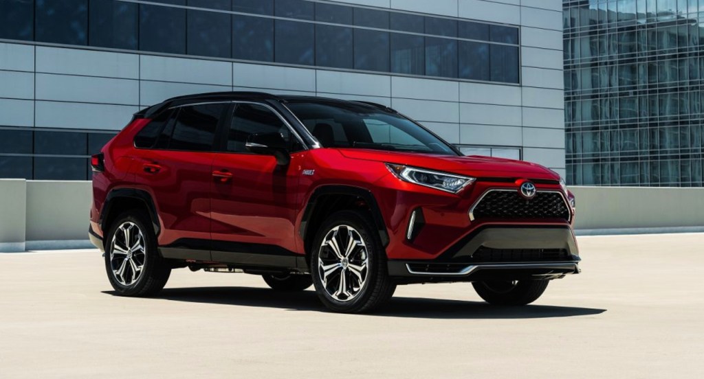 A red 2022 Toyota RAV4 Prime is parked. 