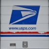 The back sliding door of a USPS (United States Postal Service) postal truck