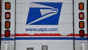 The back sliding door of a USPS (United States Postal Service) postal truck