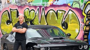 A wax Vin Diesel with his Dodge Challenger muscle car from 'Fast & Furious' seen at Madame Tussauds in Berlin, Germany