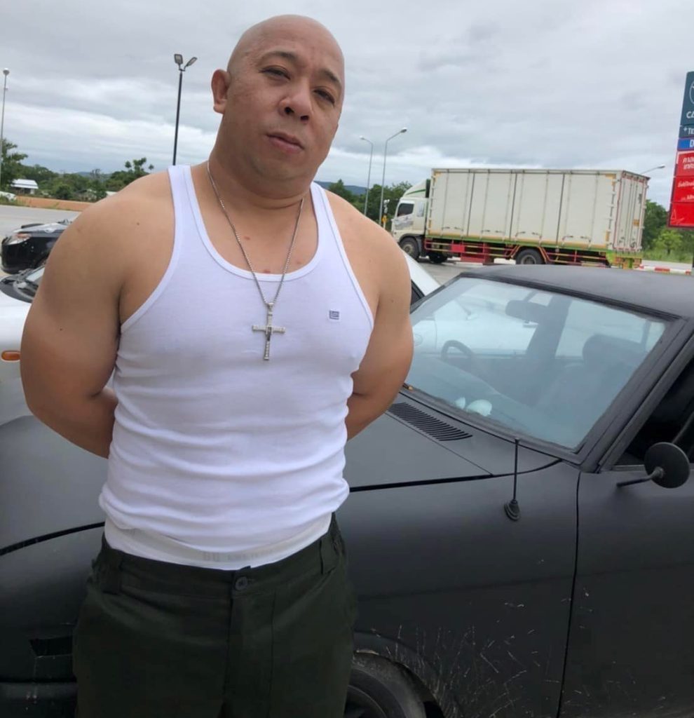 Vin Diesel look-alike in Thailand posing in front of "Ford Mustang" disguised as Fast and Furious Dodge Charger