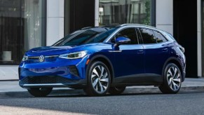 A blue 2022 Volkswagen ID.4 electric SUV is parked.