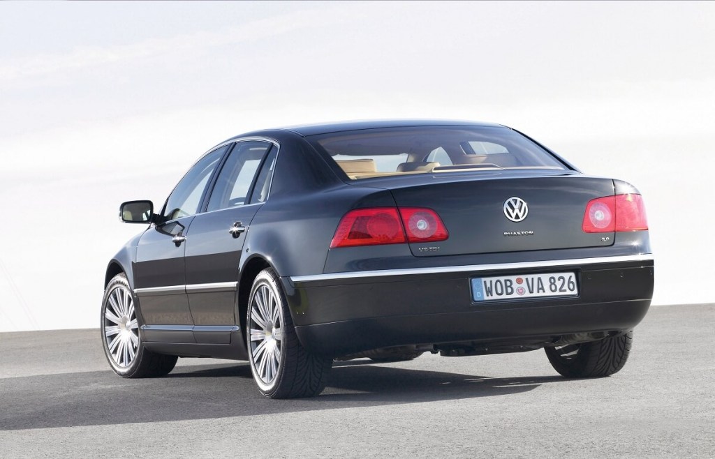 A black Volkswagen Phaeton, a 200 MPH performance luxury sedan, shows off its rear-end styling. 