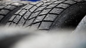 A close-up of a tire with water on it