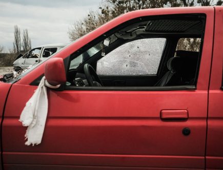 What Does a White Towel or Bag on a Broken-Down Car Mean?