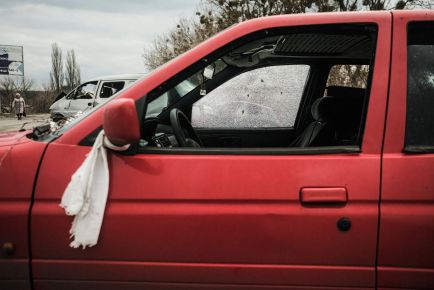 What Does a White Towel or Bag on a Broken-Down Car Mean?