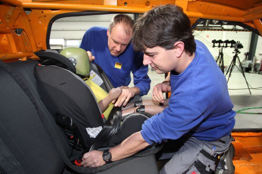 A crash test dummy child seat car safety test