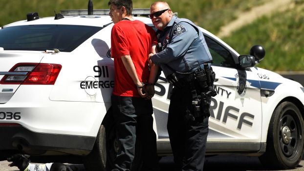 A car theft suspect arrested by a sheriff in Denver, Colorado