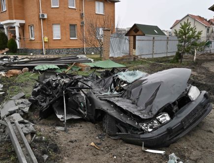 A Military Vehicle Crushed a Car in Ukraine but Neighbors Were Able to Save the Elderly Driver