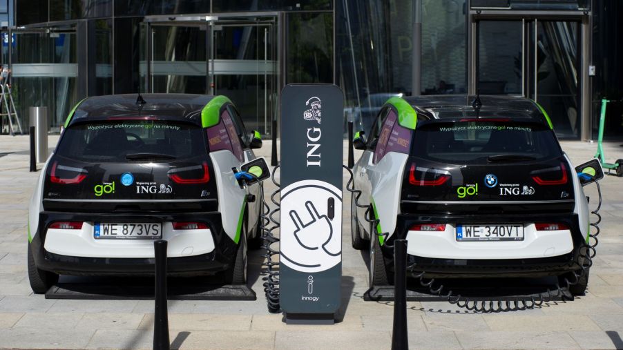 BMW i3 EV models charging at an electric vehicle charging station