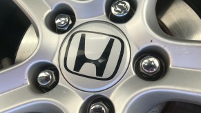 An OEM Honda wheel lock shown on a Honda wheel