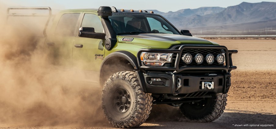 AEV Prospector XL | AEV in green, kicking up dust