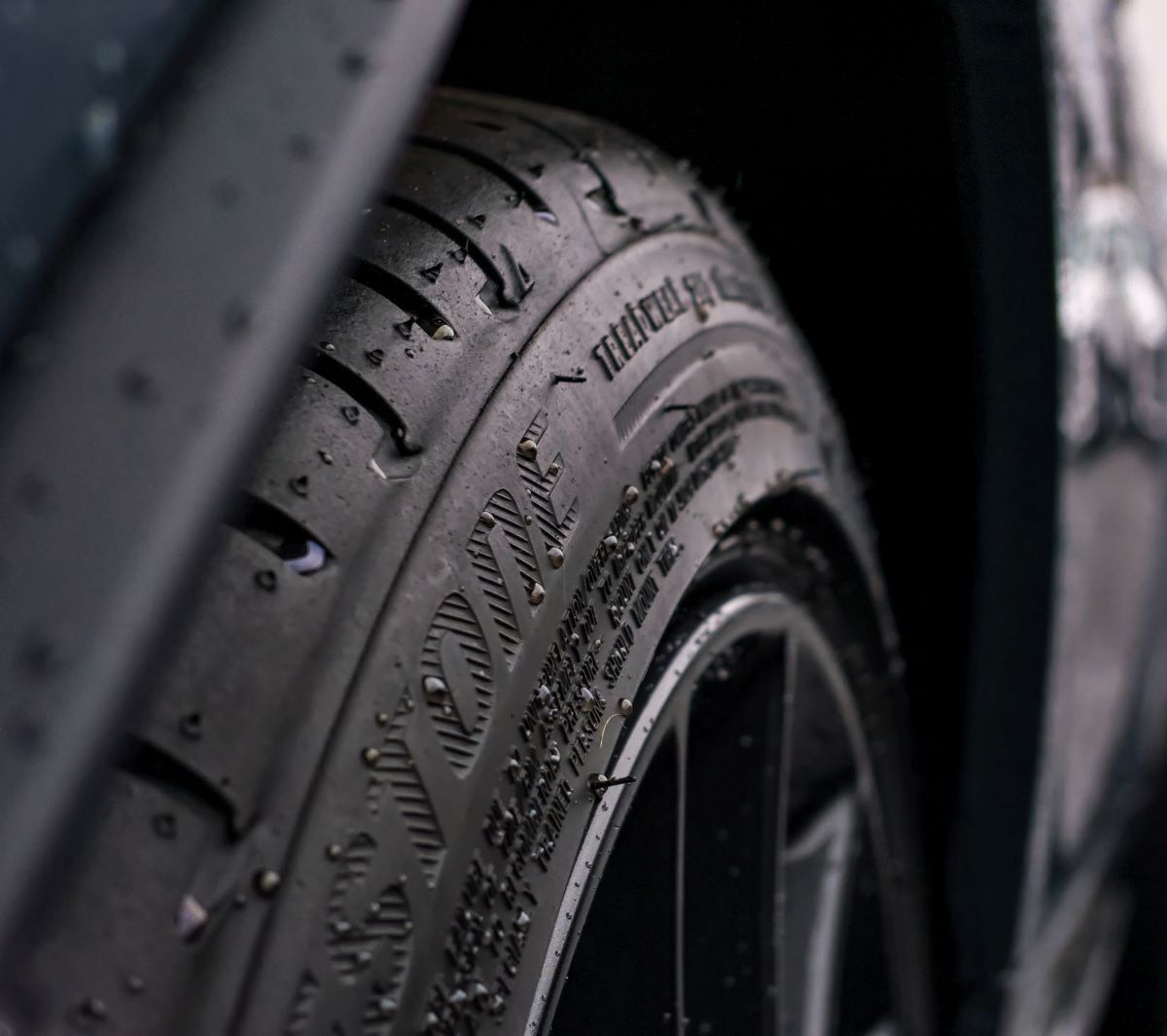 Close-up of a car tire; car tire pressure should be neither too high nor too low