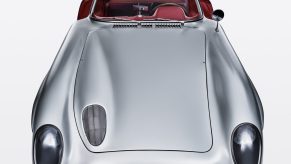The front view of the silver 1955 Mercedes-Benz 300 SLR Uhlenhaut Coupe with its doors open