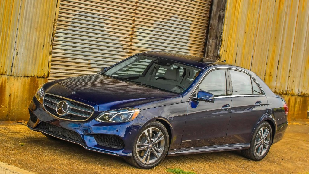 a shining example of luxury, the 2014 mercedes-benz e-class, a great used luxury sedan, is parked showing off the sleek body lines