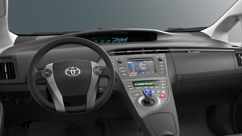 the modern, comfortable, and spacious interior of a used 2015 toyota prius
