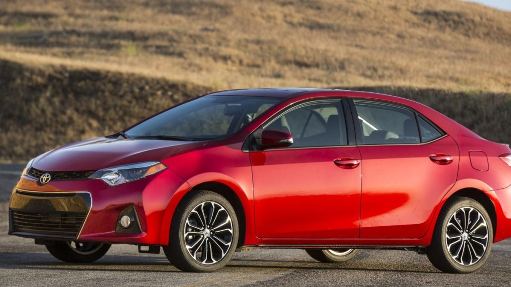 a red 2016 toyota corolla s, a sportier version of the popular compact sedan
