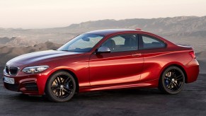 a 2018 bmw 2 series coupe parked at sunset showing off the stylish body lines