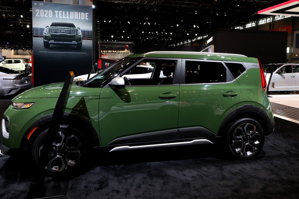 The side 3/4 view of a green 2020 Kia Soul X-Line at the 2019 Chicago Auto Show