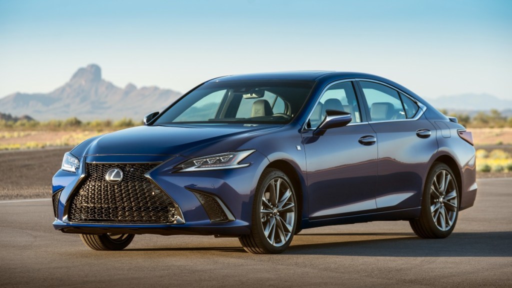 a blue 2020 lexus es is parked showing off the sleek body lines that make it a great used luxury car