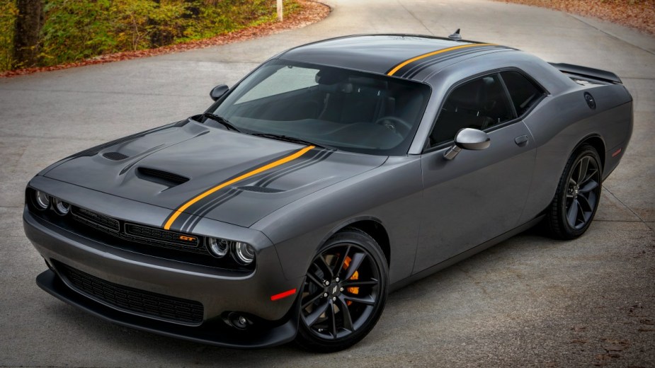 a 2022 dodge challenger with orange hemi appearance package, a great performance coupe