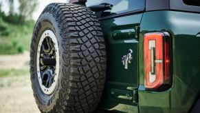 A green 2022 Ford Bronco on display.
