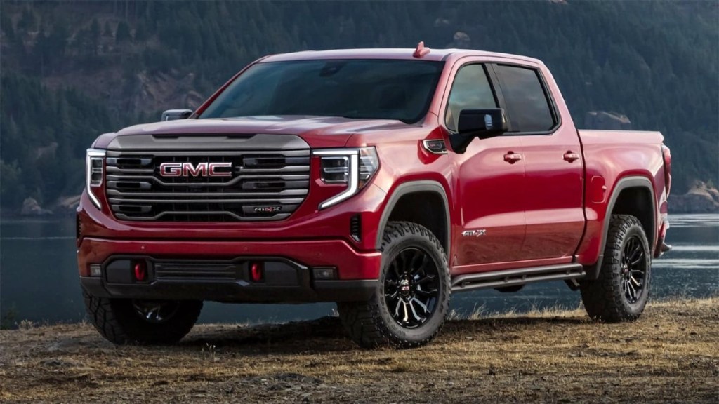 A red 2022 GMC Sierra 1500 AT4X is off-roading.