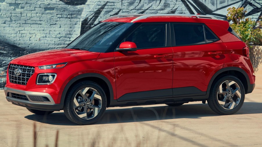 A red 2022 Hyundai Venue subcompact SUV is parked.