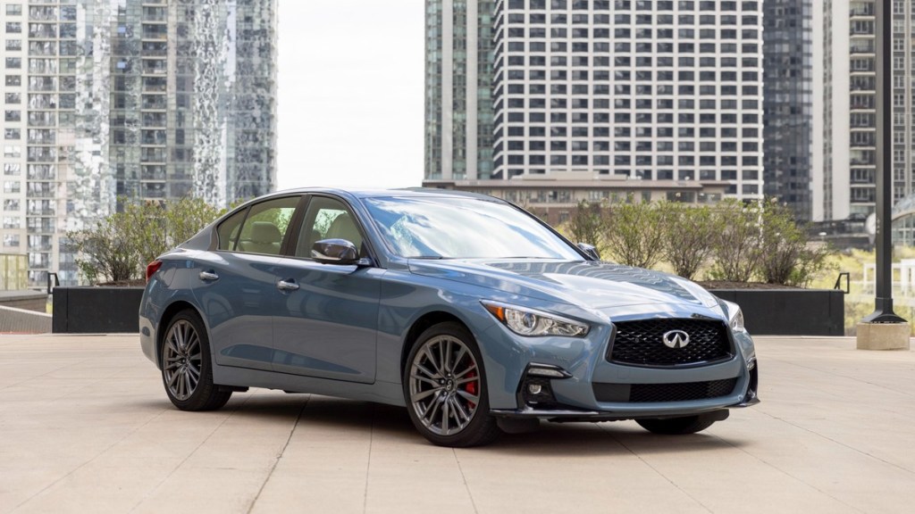 the new 2022 infiniti q50 parked in the city showing off its top-notch luxury and sleek design