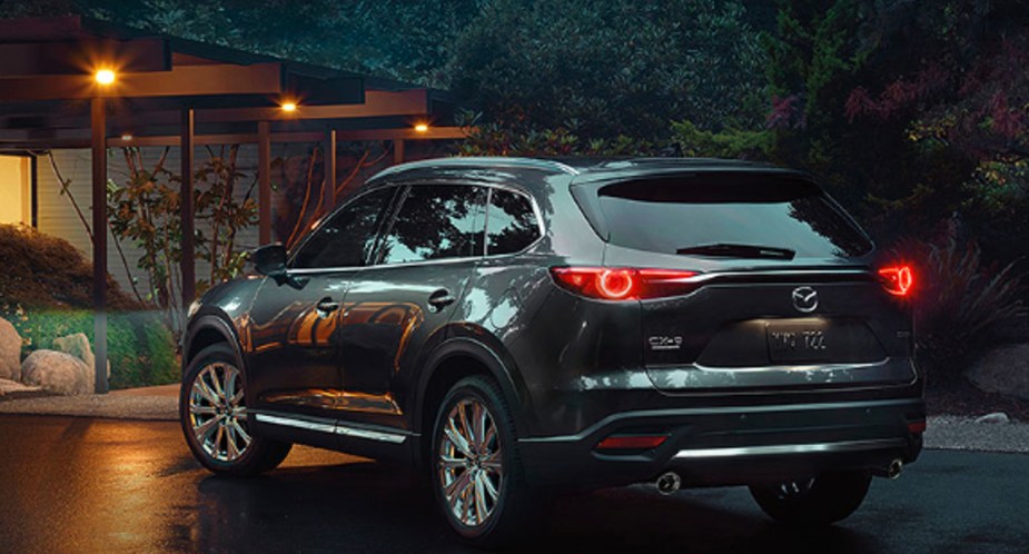A gray 2022 Mazda CX-9 midsize SUV is parked outdoors. 
