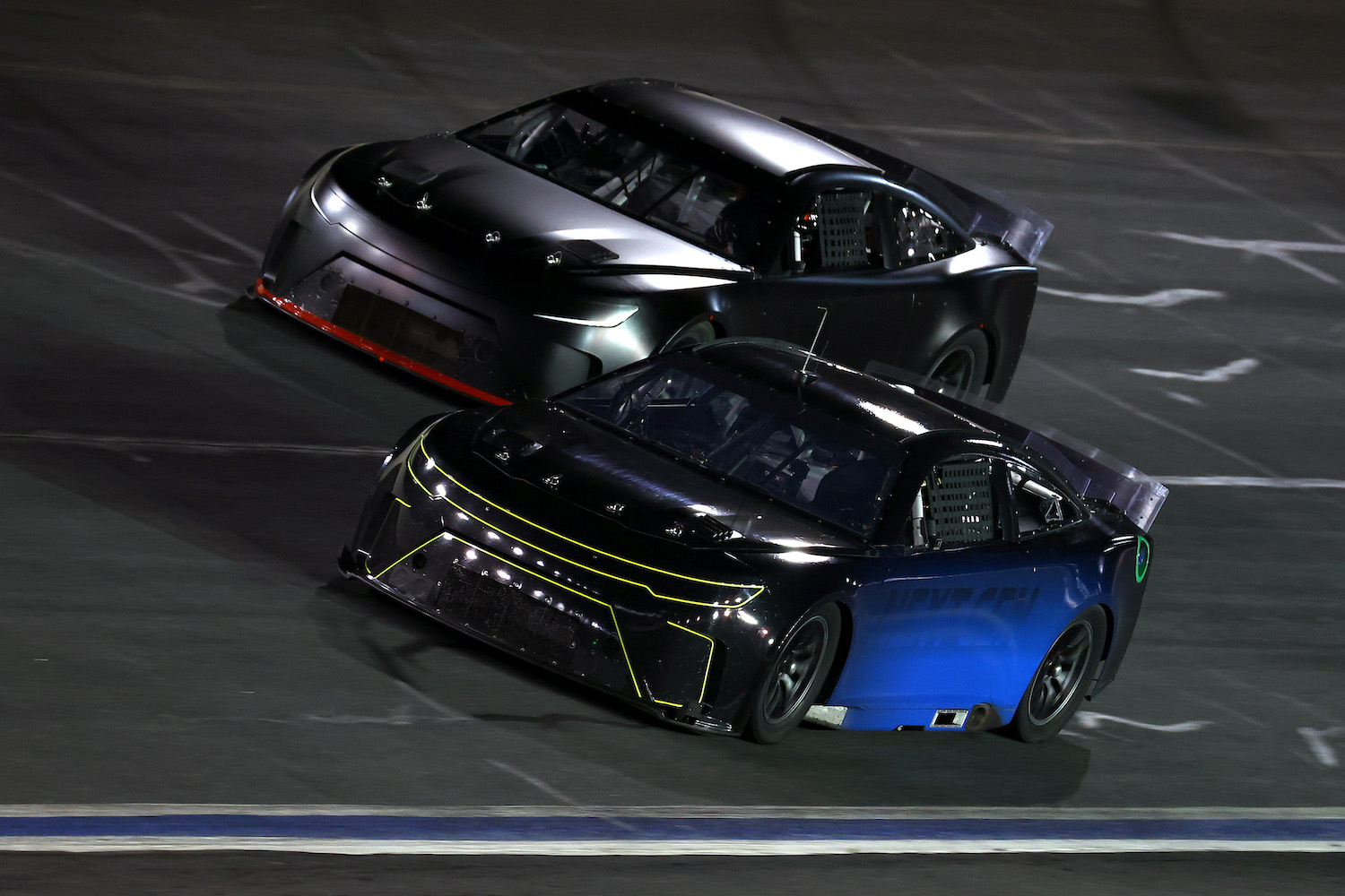 Two NASCAR Next Gen cars completing drafting testing.