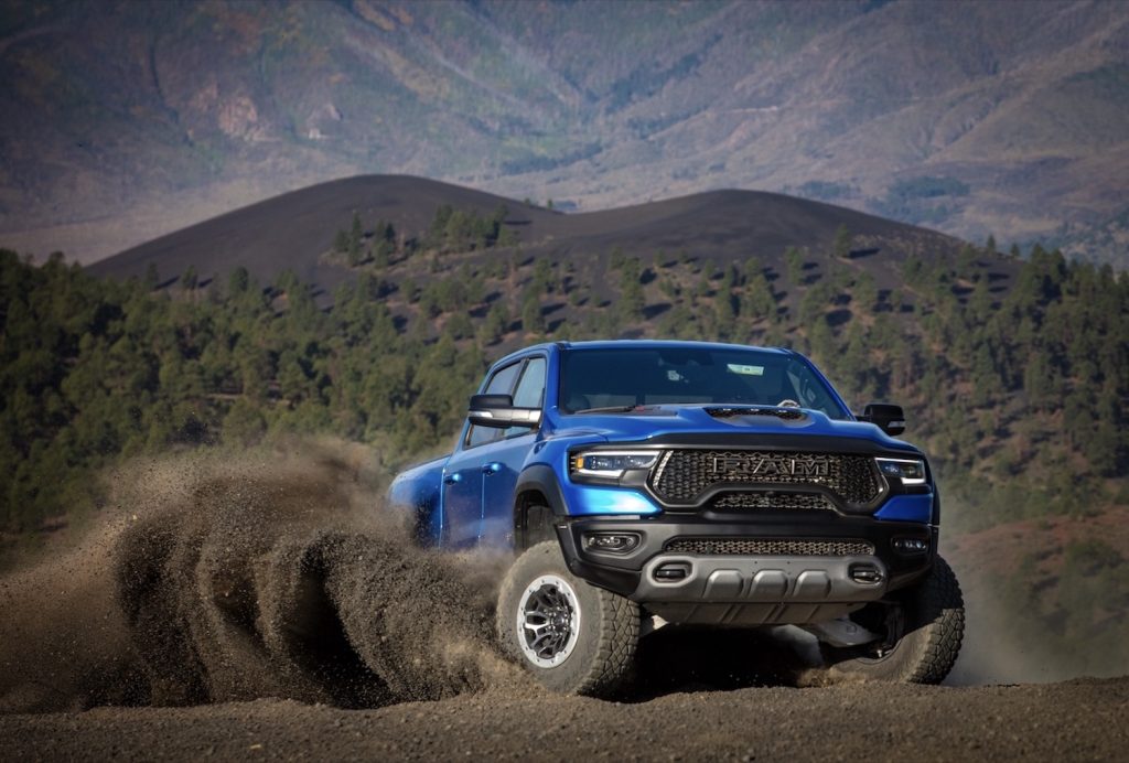 A Ram TRX truck likely in four-wheel-drive high for quickly blasting off road trails. 