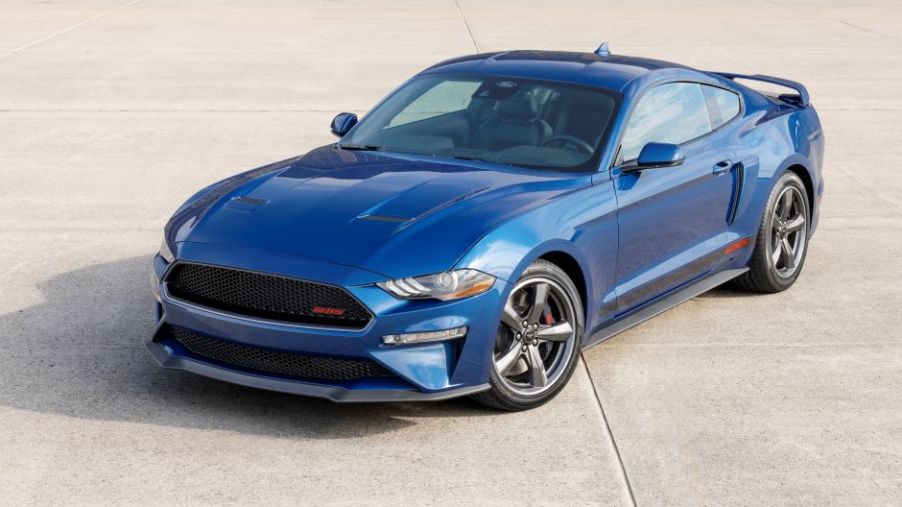 Blue 2022 Ford Mustang GT California Special. The Mustang is cheaper than the 2022 Dodge Challenger.