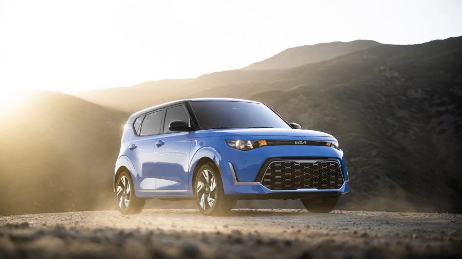 A Surf Blue 2023 Kia Soul GT-Line with a black roof in the desert