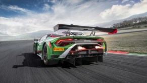 Rear end and flame spitting exhaust from new Lamborghini Huracan GT3 EVO2 STO based supercar race car on track