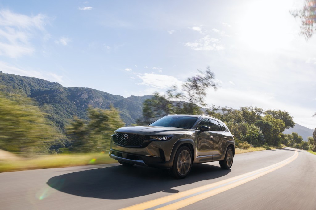 2023 Mazda CX-50 driving on road 
