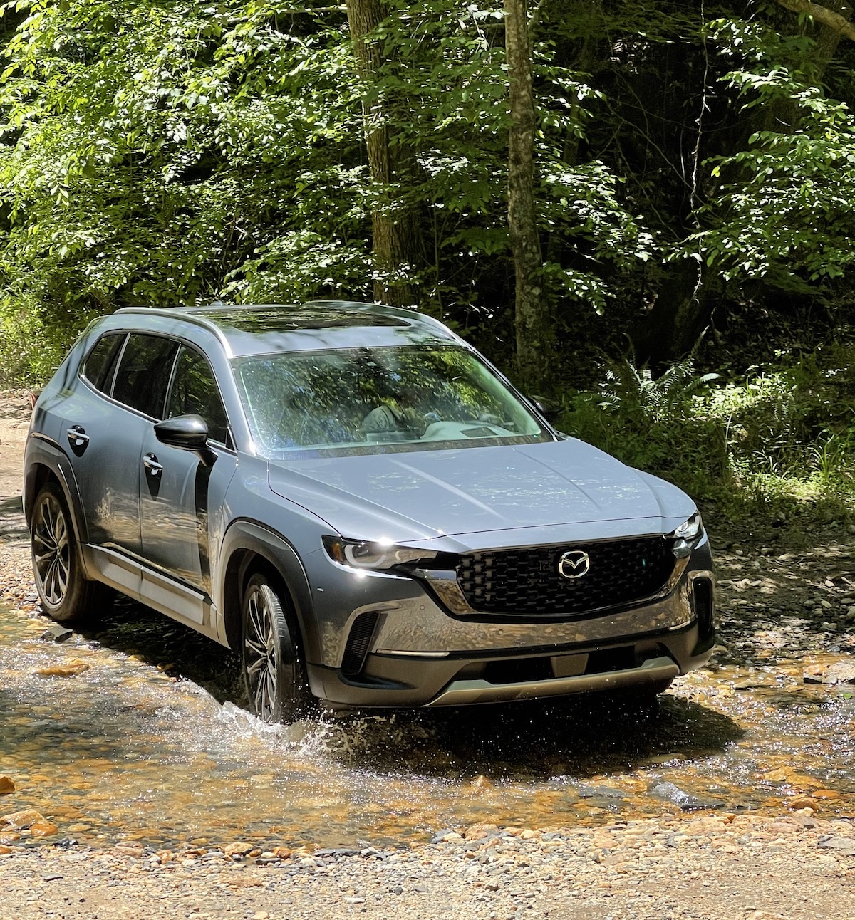 2023 Mazda CX-50 in a creek 
